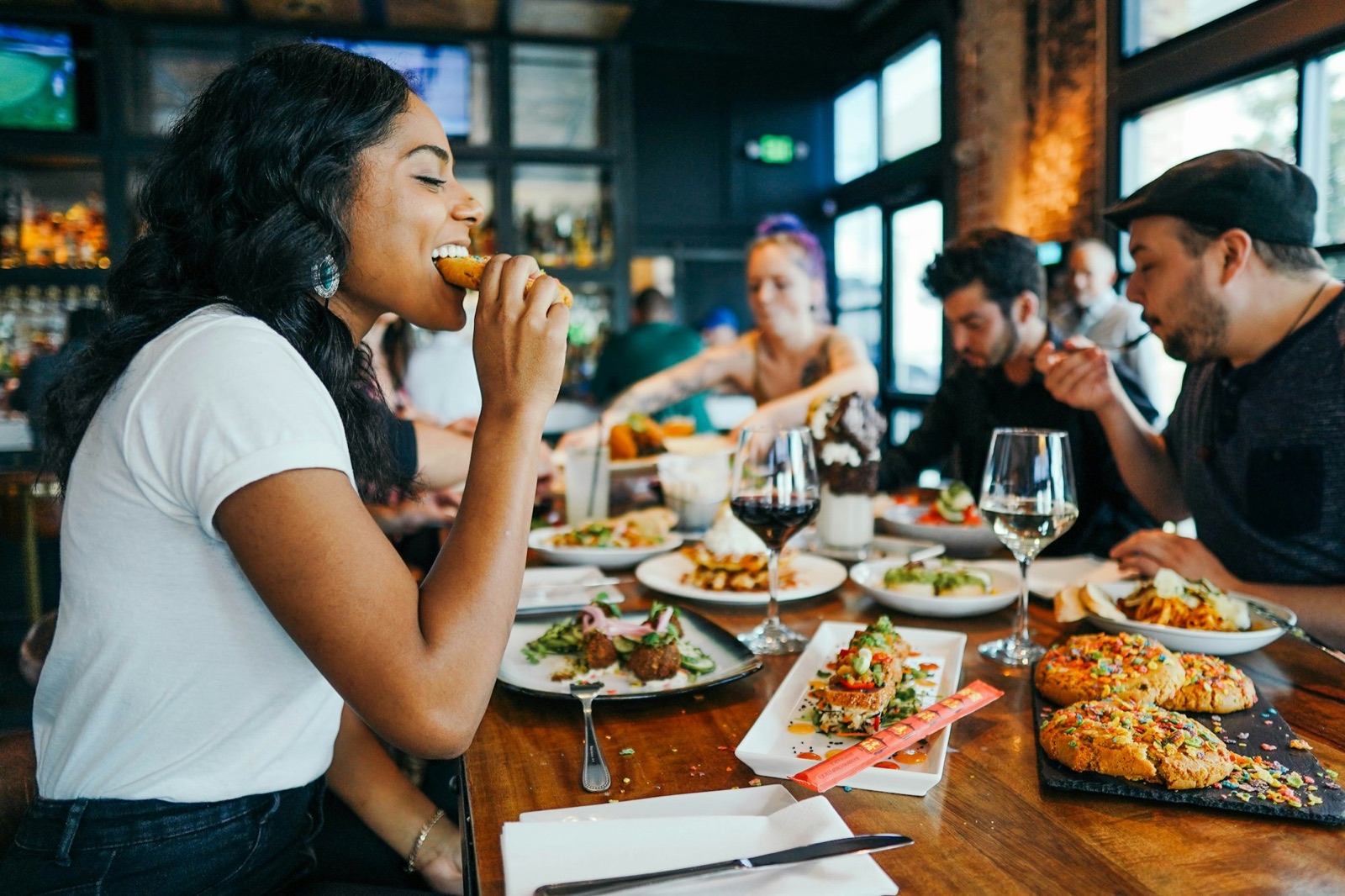 Diners sharing a meal at a local restaurant